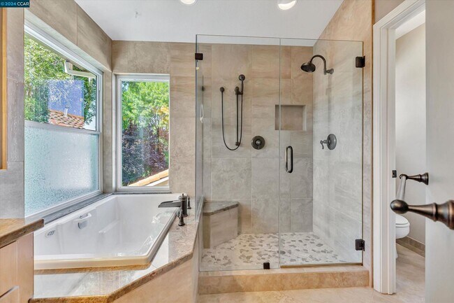 Building Photo - Updated Mediterranean-style home in Renais...