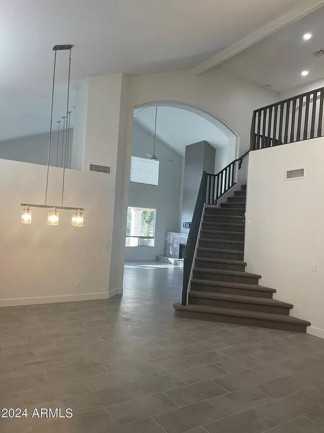 Building Photo - 6739 E Gelding Dr