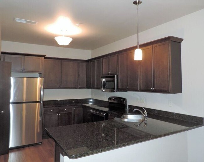 Building Photo - $1,635| 2 Bedroom, 2 Bathroom 1st Floor Condo | Pet Friendly* | Available for August 1st, 2026 Mo...