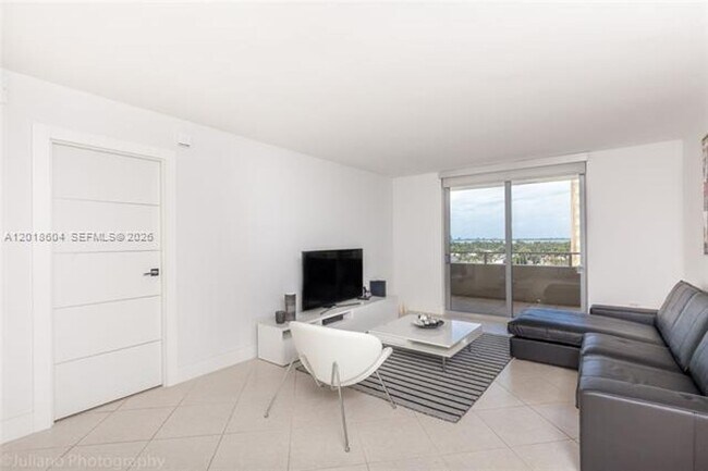 Building Photo - 5555 Collins Ave
