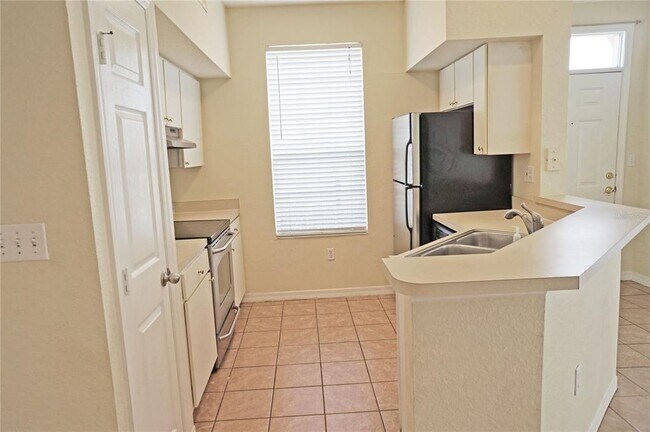 Building Photo - 9850 Lake Chase Island Way