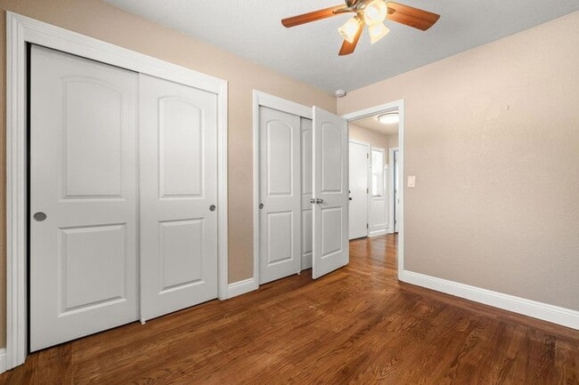 Building Photo - Welcome to this stunning 4-bedroom, 2-bath...