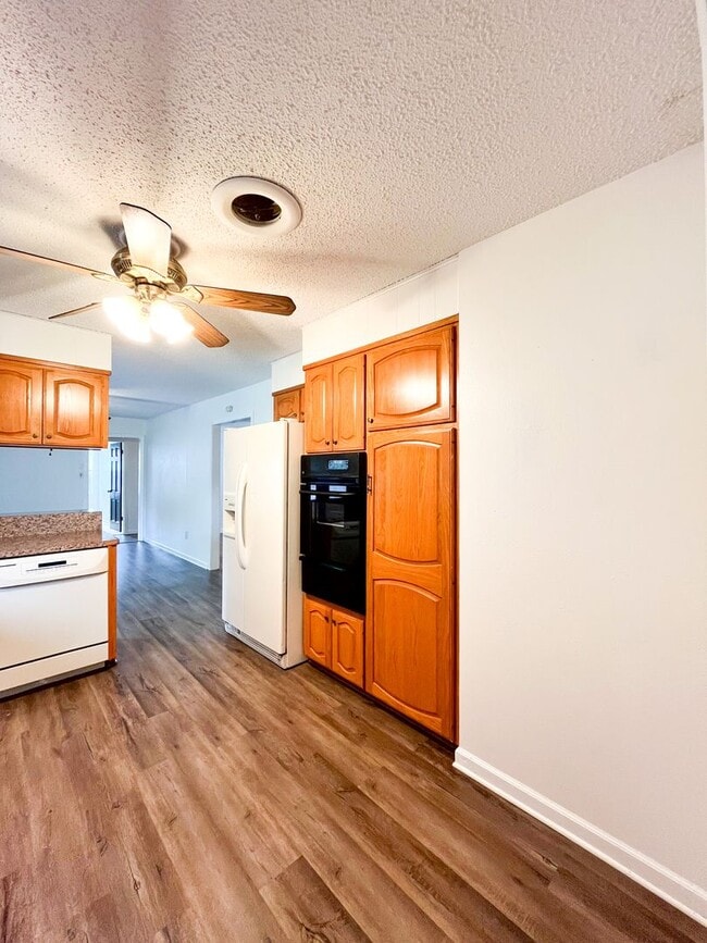 Building Photo - Available Now!!!! Gorgeous 3 bedroom, 2 bath, 2 car garage home. Beautiful wood look flooring. Sp...