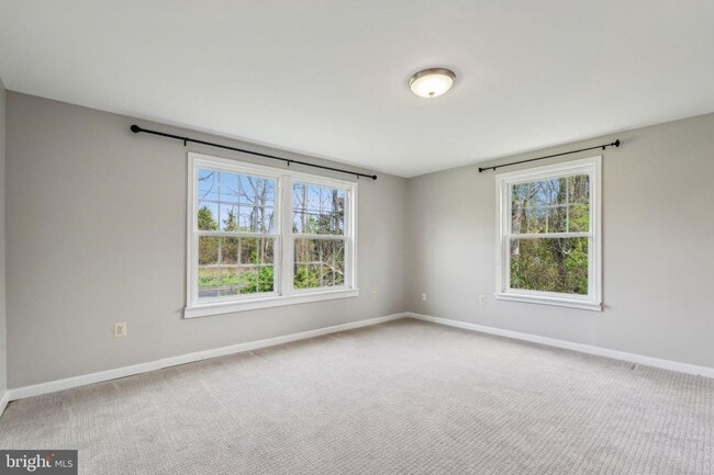 Building Photo - Experience the perfect blend of peaceful country charm and modern comfort in this beautifully ref...