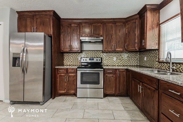 Building Photo - 6205 Magnolia Ln