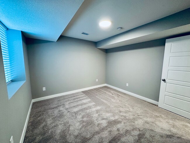 Building Photo - {13305} Less Than 2 Year Old 1.5 Story in ...