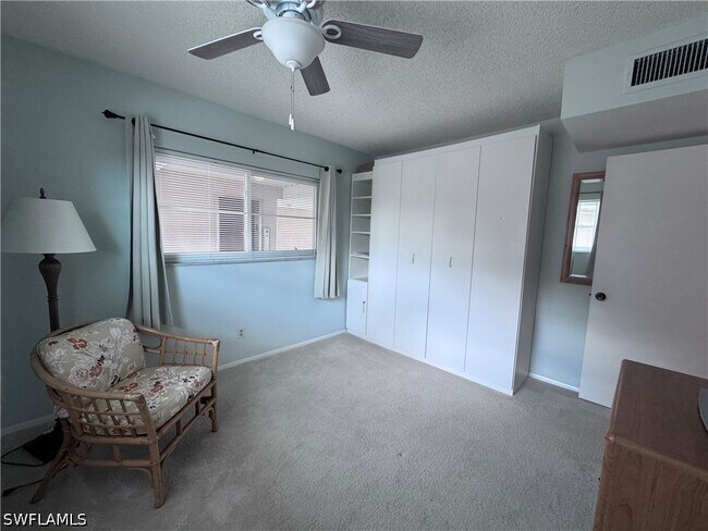 Building Photo - 4912 Tamiami Trl E