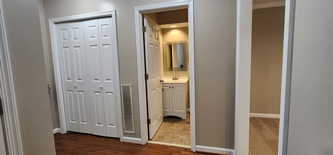 Coat closet and powder room - 13 Steeple Ct