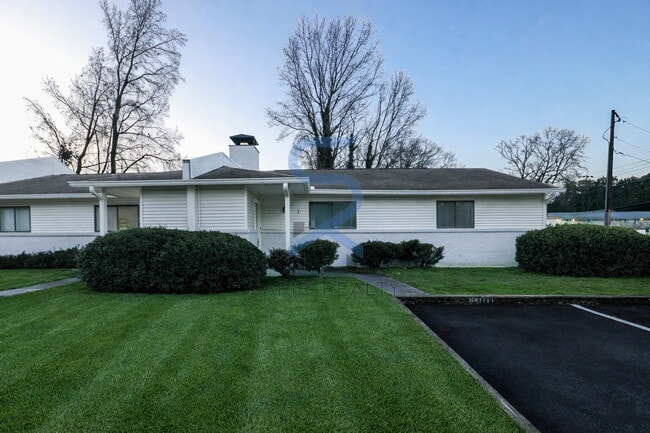 Building Photo - Move in before December 31st and choose your reward: a $250 Amazon Gift Card or a 55" Smart TV!