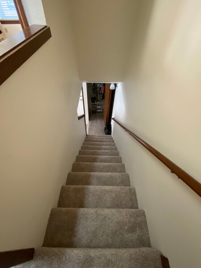 coat closet, stairs to second floor - 1439 SW Montgomery St