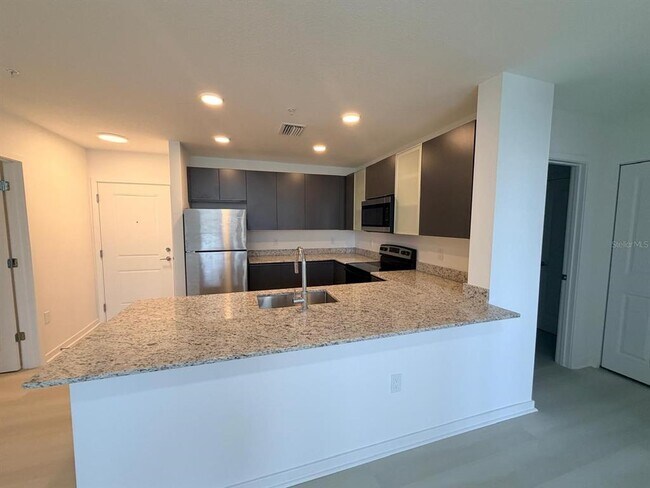 Building Photo - 5563 Millennia Park Dr