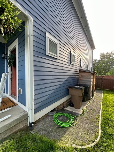 Graveled side yard with cement pad - 1716 Northview Ave