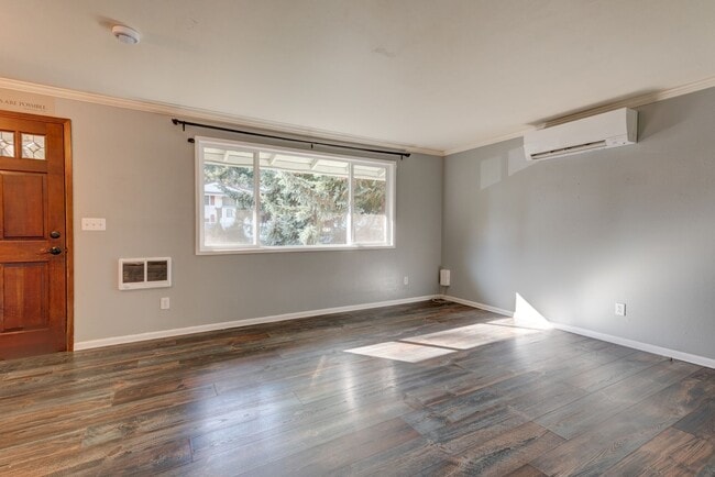 Building Photo - Spacious 4-Bedroom Home with Fireplace, Fenced Yard, and 2-Car Garage