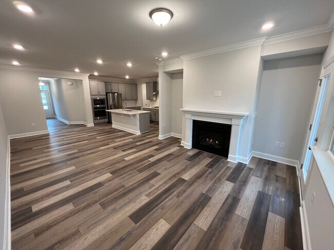 Building Photo - Newly Built 4BD, 3BA Cary Townhome with Modern Amenities and Screened-In Patio