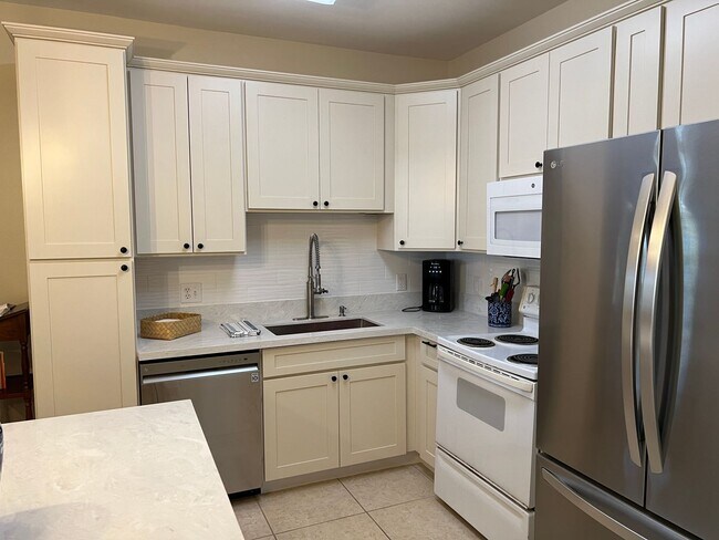 Building Photo - Remodeled and Fully Furnished, ground floo...