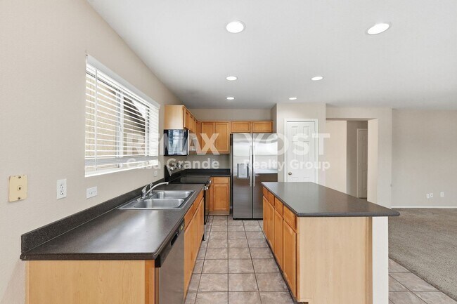 Building Photo - Light-Filled Home with Open Living Areas and Private Outdoor Space