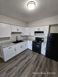 Building Photo - NEWLY RENOVATED!- FREE TV WITH SIGNED LEASE