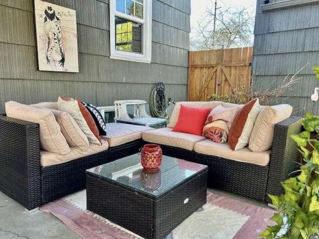 Outdoor seating area for lounging or dining in backyard. - 4115 SE Gladstone St