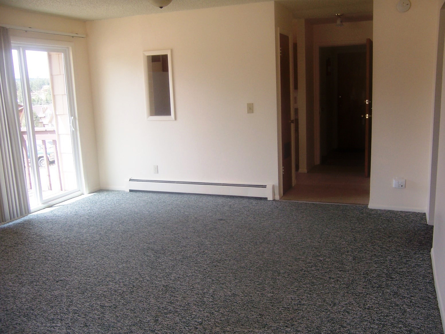 Family Room/Dinette Area has Handy Pass-Through from Kitchen. Also Patio Door to Deck - 506 Mountain View Pl