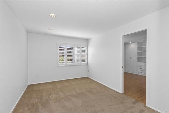 Building Photo - Poolside Living at Its Finest – Turnkey 3BR Condo with Direct Patio Access to the Pool