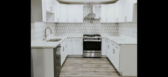 Building Photo - AVAILABLE JULY - Newly Remodeled 4 Bedroom SLO Home