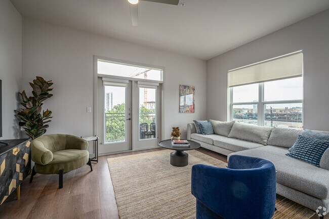 Building Photo - Stylish Spaces in the Center of It All