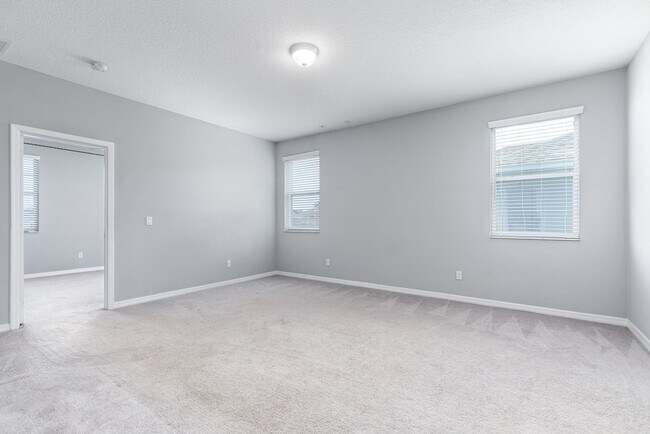 Building Photo - PRATICALLY BRAND NEW HOME IN GATED COMMUNITY!