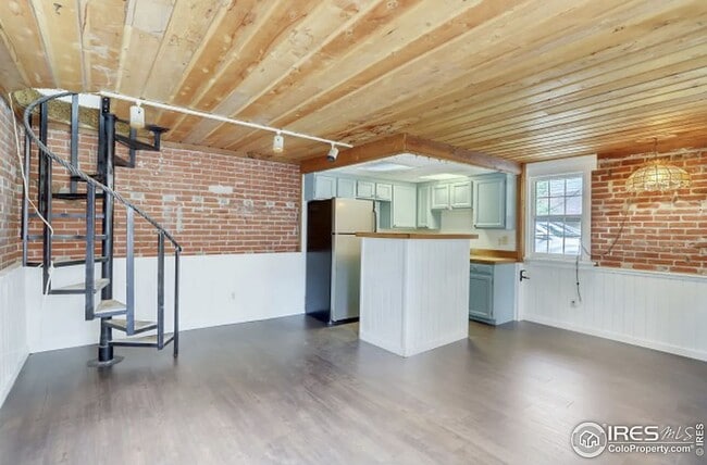 Building Photo - Charming Historic Carriage Home Steps from Pearl Street - Boulder Living at Its Finest!