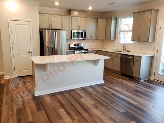 Building Photo - Brand New 3 BR 1-Car Garage Townhome in Do...