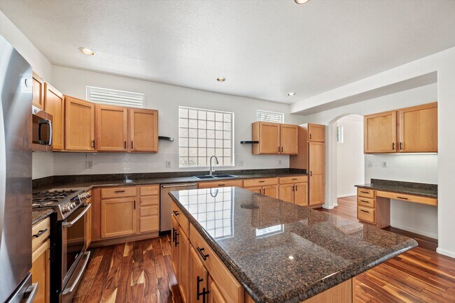 Building Photo - Stunning Tennyson Park Home | 4 Bedrooms, Finished Basement & Open Space Views