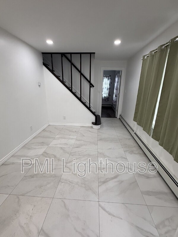 Building Photo - 115 8th Ave