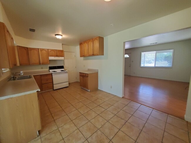 Building Photo - Price Reduced! 3 Bedroom 2 Bath House with Large Yard Available Now!