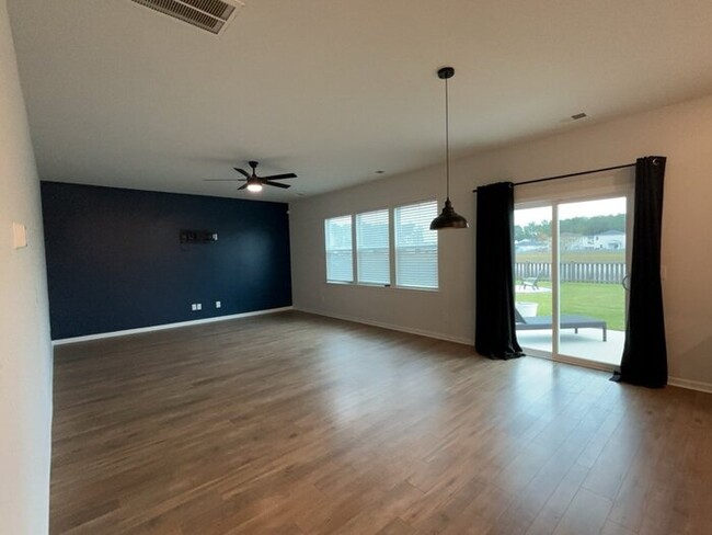 Building Photo - "Discover Spacious Comfort: 4-Bedroom Gem ...