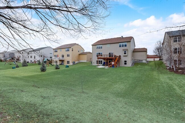 Building Photo - Grand 5 bed 4.5 bath Maple Grove Home w/ 3-Car Garage! Fully Furnished
