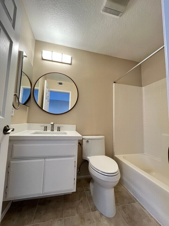 Building Photo - PICTURE PERFECT!  3 BR/3 BA END UNIT CONDO with DIRECT ACCESS 2 CAR GARAGE