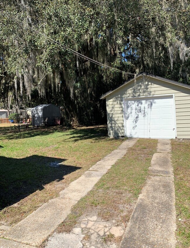 Building Photo - Charming Corner-Lot Home with Huge Fenced Yard & Detached Garage