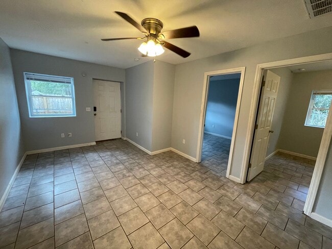 Building Photo - Open floor plan, four-bedroom two-bathroom with washer and dryer