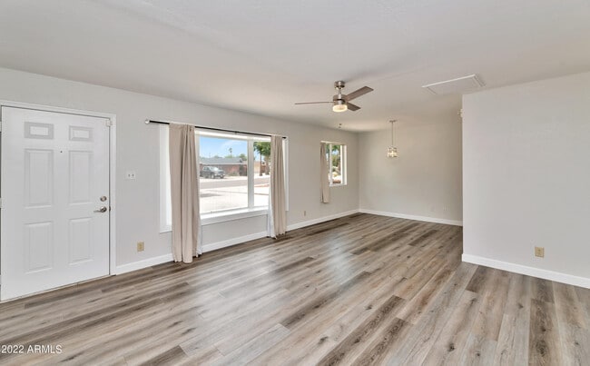 Building Photo - 8444 E Plaza Ave