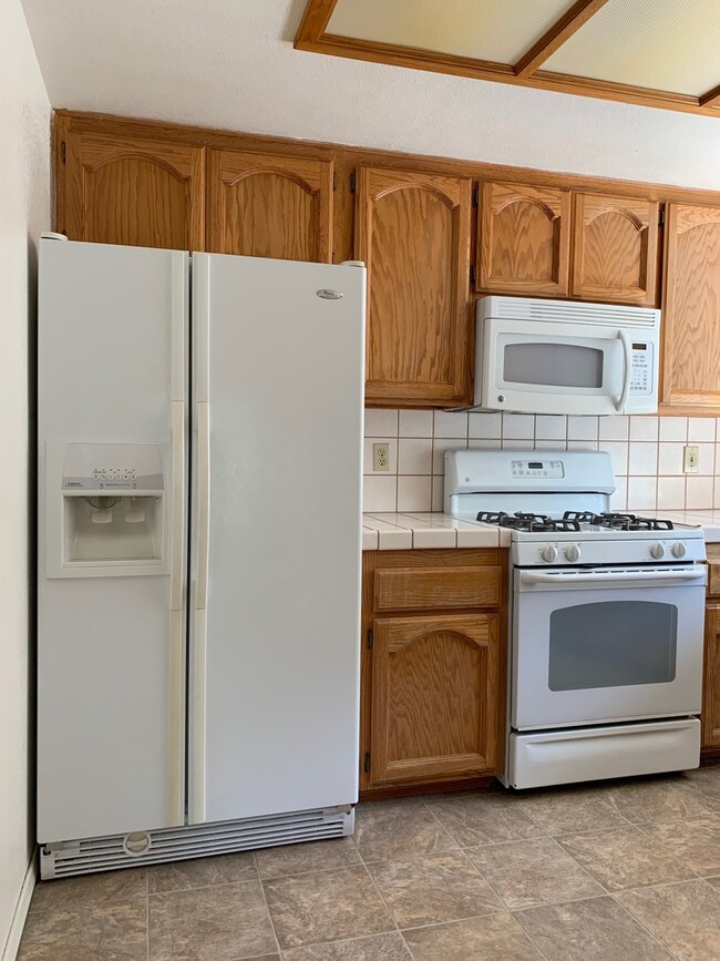 Building Photo - Spacious 3-Bedroom Home with Greenbelt Views & Landscaping Included
