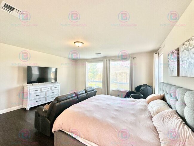 Building Photo - Welcome to your dream home, where modern elegance meets unparalleled convenience!