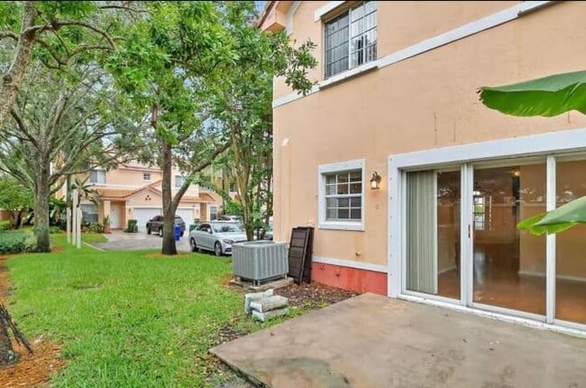 Building Photo - 8678 SW 23rd Ct