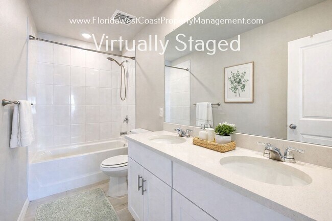 Building Photo - BRILLIANT and SPACIOUS! 4 BEDROOM/2.5 BATH PLUS LARGE BONUS-FLEX SPACE and FENCED YARD!