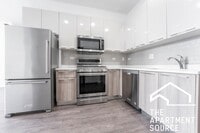 Building Photo - MASSIVE Loft-style condo-quality 3 Bed/2 ba IN UNIT LAUNDRY