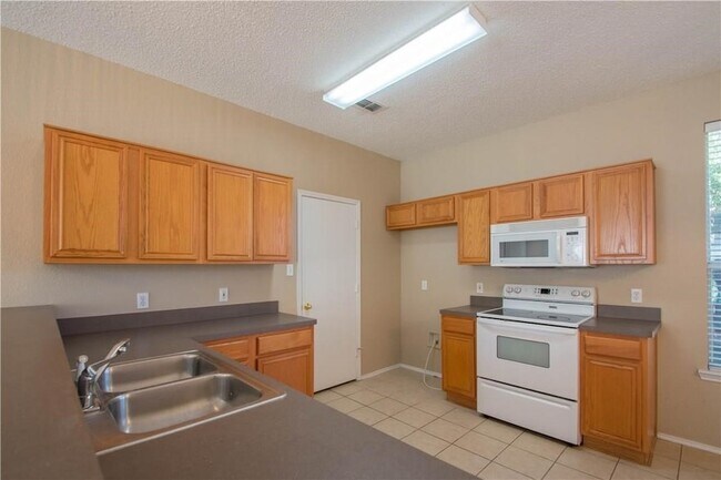 Building Photo - 6316 Downeast Dr