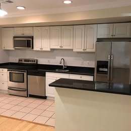 Open concept kitchen, stainless steel appliances - 1242 Queen St NE