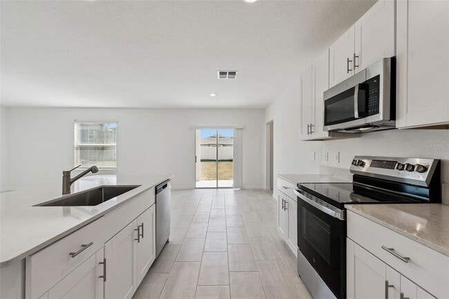 Building Photo - 1712 Tropical Oasis Ave