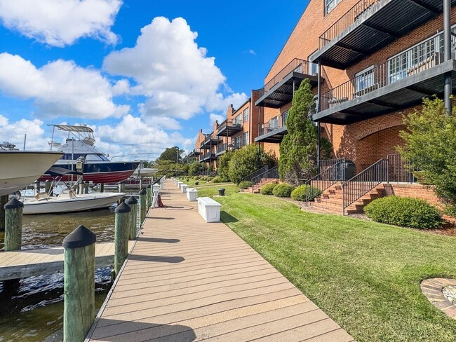 Building Photo - Fully Furnished Waterfront Elegance on Mai...