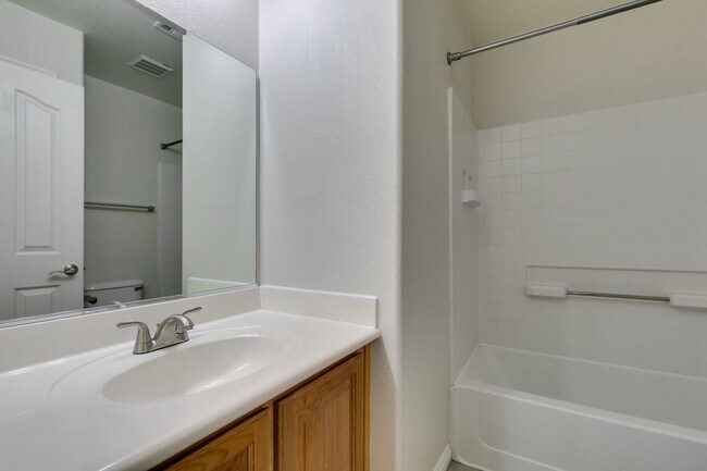 Building Photo - Great townhome in Henderson Gated Community with a 2 car attached garage and backyard