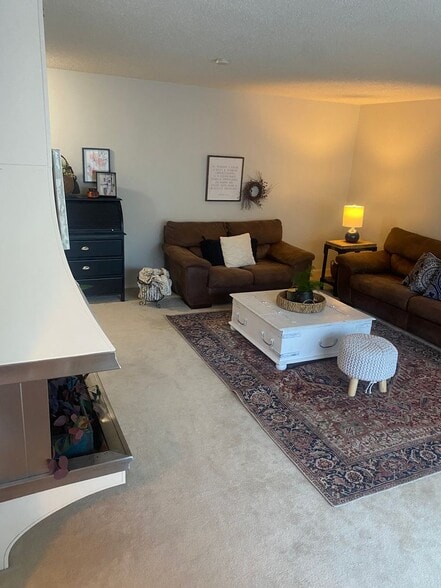 Building Photo - Convenient 2 Bedroom 2 Bathroom Condo Living "In The Trees" with On-Site Amenities