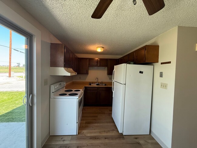 Building Photo - Two Bedroom, One and half bath townhome close to Regional West Medical Center.